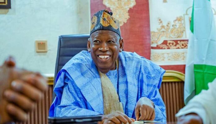 ZG4bRFfB-Ganduje-APC-National-Chairman